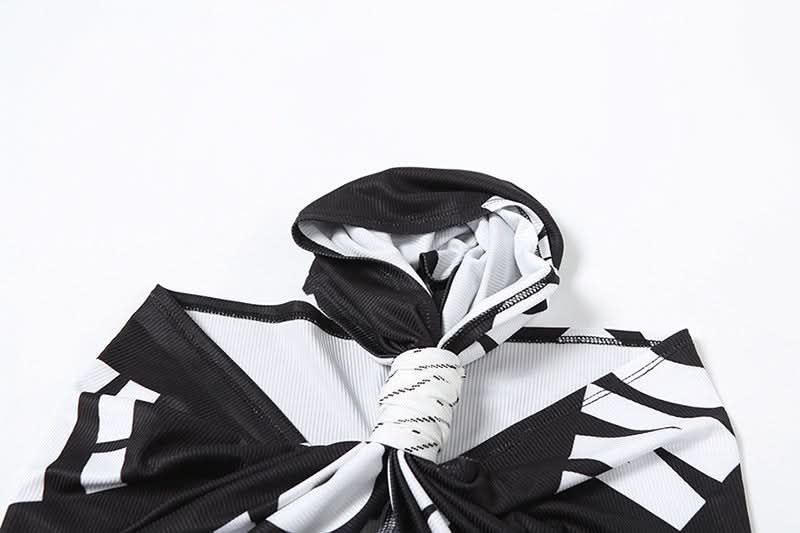 Effortless Edge: Black & White Twist-Front Halter Crop Top | American Fall Street Style