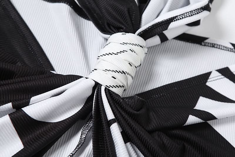 Effortless Edge: Black & White Twist-Front Halter Crop Top | American Fall Street Style