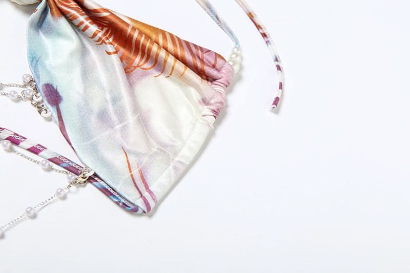 Y2K Tropical Abstract Halter Bow Top & Ruched Mini Skirt Set with Pearl Body Chain - Perfect for Fall Getaways & Club Nights