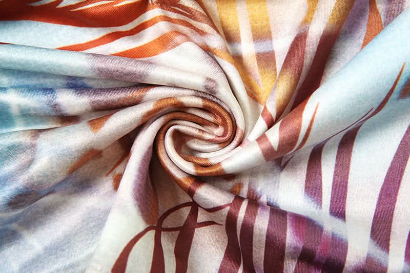 Y2K Tropical Abstract Halter Bow Top & Ruched Mini Skirt Set with Pearl Body Chain - Perfect for Fall Getaways & Club Nights