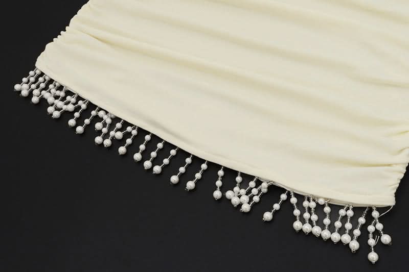 Autumn Allure: Mocha Halter Ruched Mini Dress with Beaded Fringe Hem – Perfect for Fall & Holiday Nights