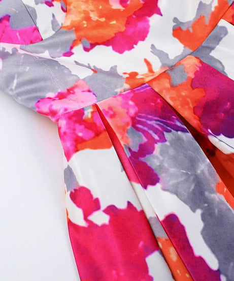 Vibrant Bloom Halter Mini Dress - Sweetheart Neckline, Pleated Skater Skirt - Perfect for Fall Getaways