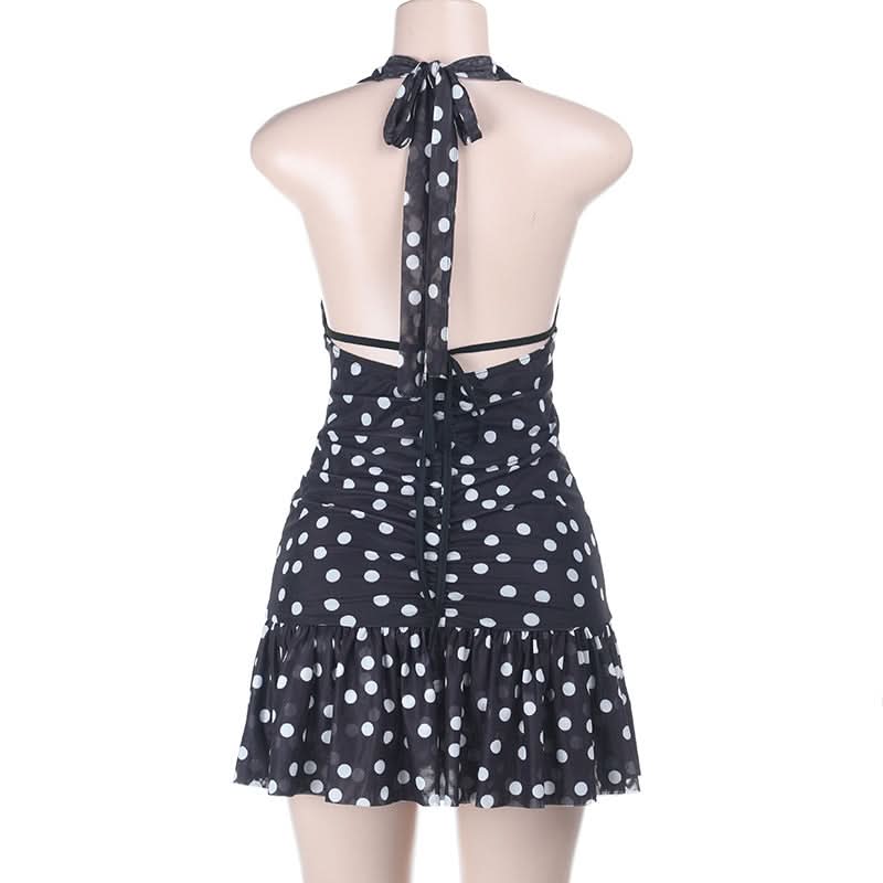 Retro Chic Polka Dot Halter Mini Dress: Flirty Ruched Style with Daisy Accents