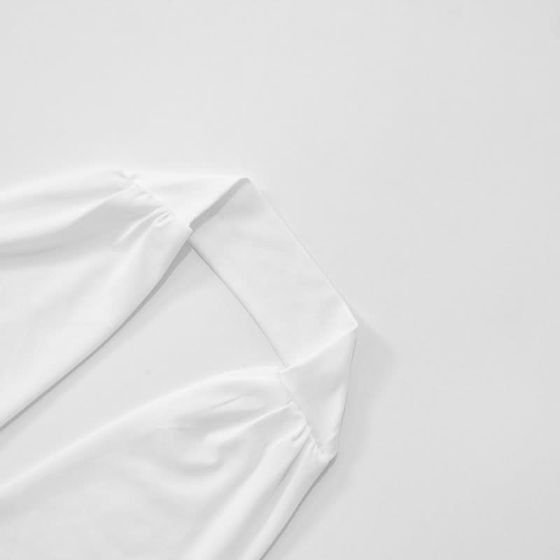 Effortless Elegance: Black & White Halter Maxi Dress with Self-Tie Waist – Your Go-To for Fall & Holiday Parties