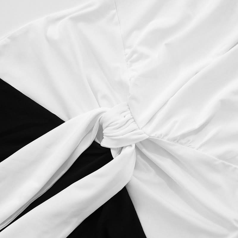 Effortless Elegance: Black & White Halter Maxi Dress with Self-Tie Waist – Your Go-To for Fall & Holiday Parties