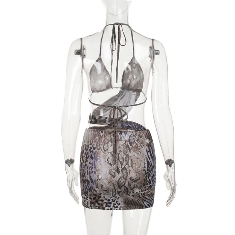 Untamed Glam: Mixed Animal Print Halter Cut-Out Mini Dress - Fierce Fall Party Style