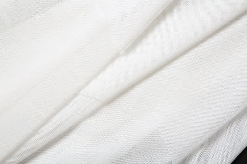 Ethereal Winter White Tiered Maxi Skirt - Chic High-Low Ruffles for Holiday & Resort Glam