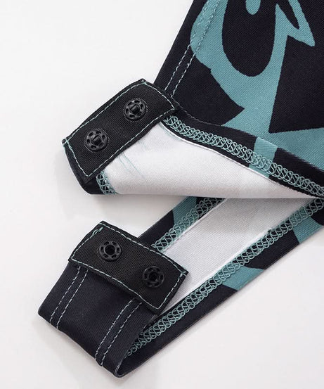 Fall '25 Abstract Wave Print Long Sleeve Jumpsuit - Teal & Black Bodycon Catsuit