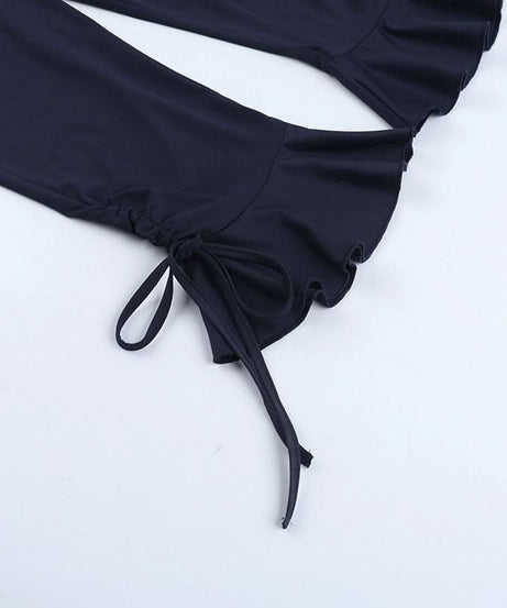 Fall Chic Halter Neck Jumpsuit | Deep V Ruched Bodice & Ruffle Tie Ankles