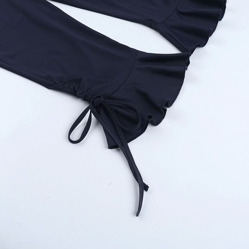 Fall Chic Halter Neck Jumpsuit | Deep V Ruched Bodice & Ruffle Tie Ankles