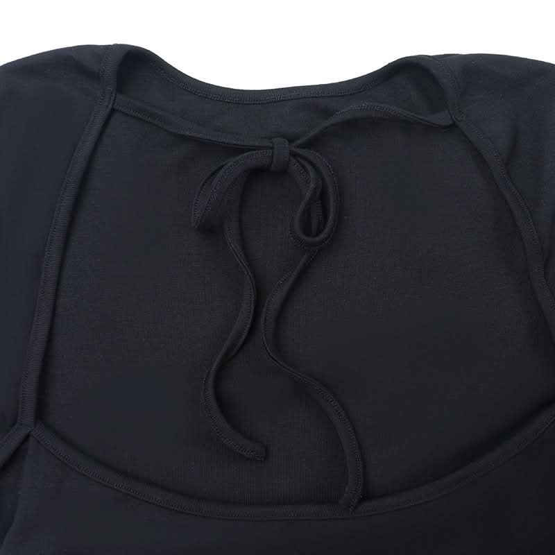 Fall Essential: Chic Black Long Sleeve Crewneck Crop Top with Self-Tie Backless Design