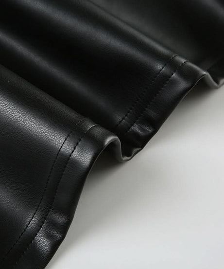 Fall's Hottest Edge: Studded Faux Leather Halter V-Neck Top