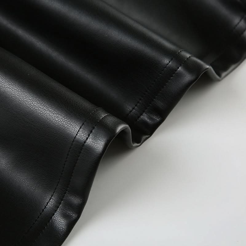 Fall's Hottest Edge: Studded Faux Leather Halter V-Neck Top