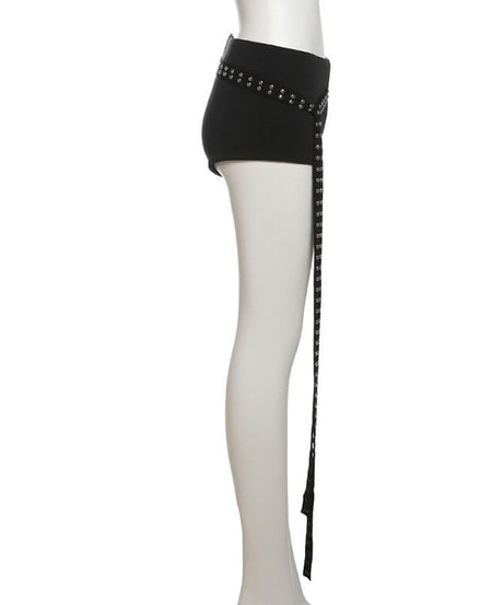Fall's Edgy Obsession: Studded Low-Rise Shorts with Cascading Strap