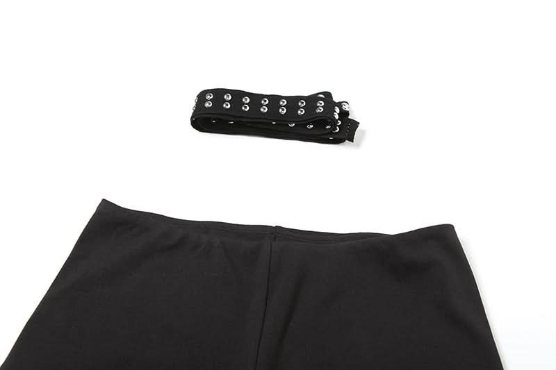 Fall's Edgy Obsession: Studded Low-Rise Shorts with Cascading Strap