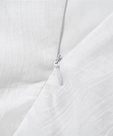 Ethereal White Halter Maxi Dress: Your Chic Escape for Fall & Winter Getaways