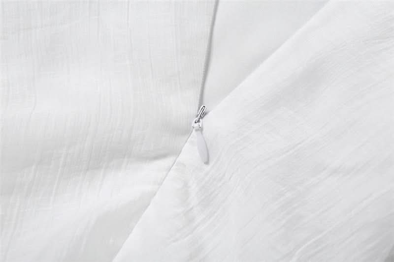 Ethereal White Halter Maxi Dress: Your Chic Escape for Fall & Winter Getaways