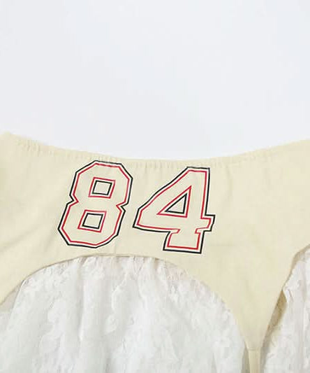 Bold '84' Retro Lace Mini Skirt - Asymmetrical Ruffle Style for Fall Nights