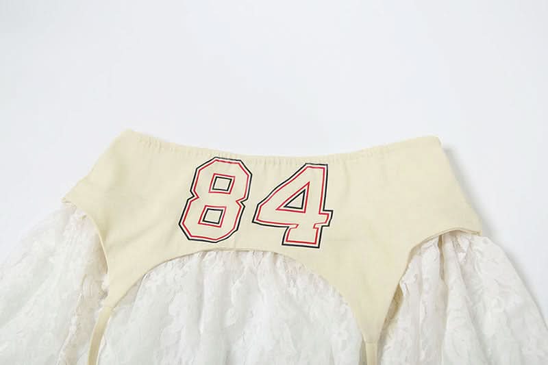 Bold '84' Retro Lace Mini Skirt - Asymmetrical Ruffle Style for Fall Nights