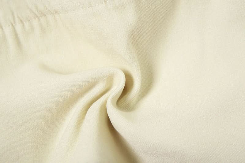 Bold '84' Retro Lace Mini Skirt - Asymmetrical Ruffle Style for Fall Nights