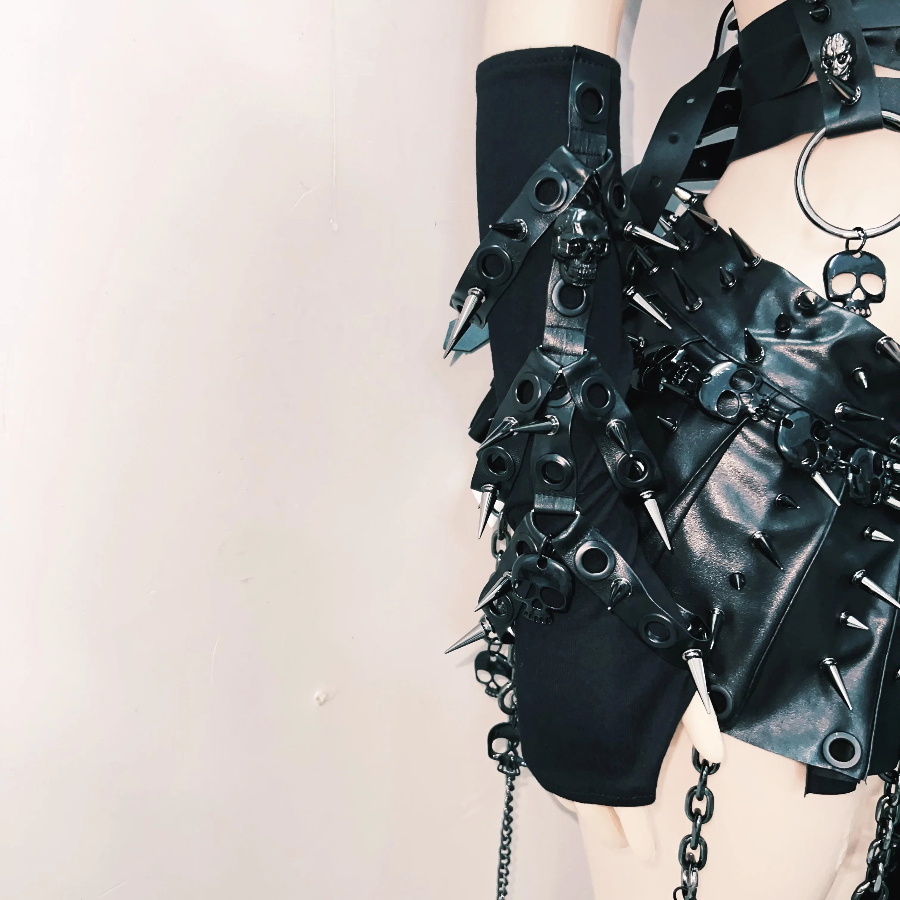 Unleash Your Inner Dark Siren: Spiked Skull Harness Mini Skirt Set – Perfect for Halloween, Raves & Goth Nights!