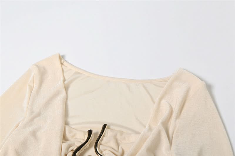 Fall & Holiday Glam: Chic Ruched Long Sleeve Jumpsuit with Statement Cutout & Flare