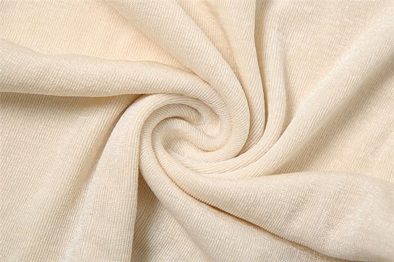 Fall & Holiday Glam: Chic Ruched Long Sleeve Jumpsuit with Statement Cutout & Flare