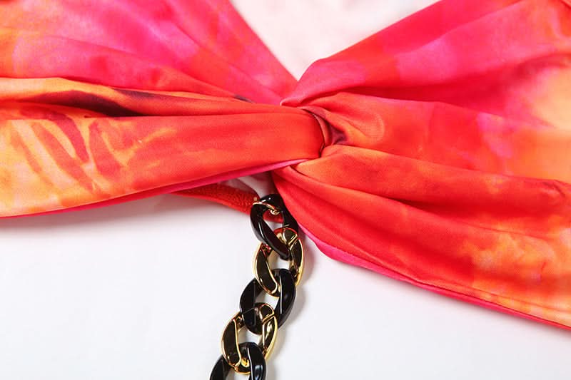 Ignite Your Style: "Fiery Sunset" Halter Crop Top & Maxi Skirt Set with Chain Detail - Bold Resort & Fall Party Wear