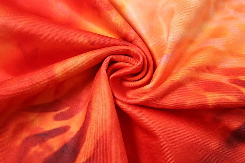 Ignite Your Style: "Fiery Sunset" Halter Crop Top & Maxi Skirt Set with Chain Detail - Bold Resort & Fall Party Wear