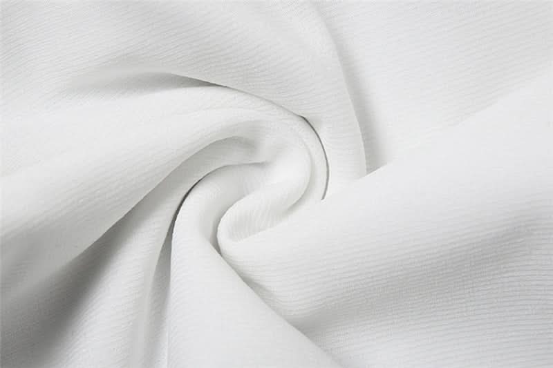 White Halter Crop Top & Flowy Maxi Skirt Set - Chic Resort Wear for Winter Escapes