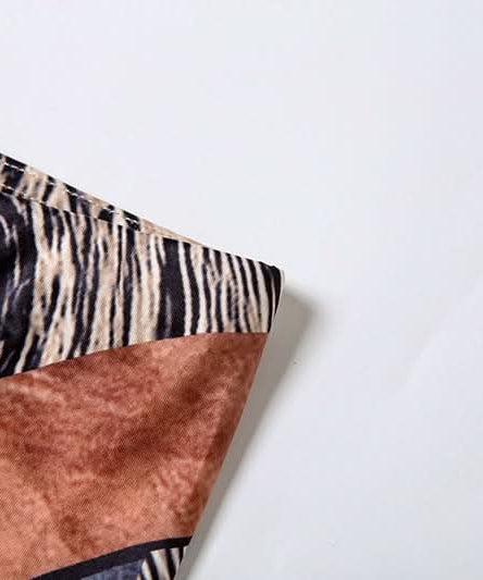 Fall Glam: Geometric Snake Print Long Sleeve Bodycon Jumpsuit - Perfect for Autumn Nights & Halloween