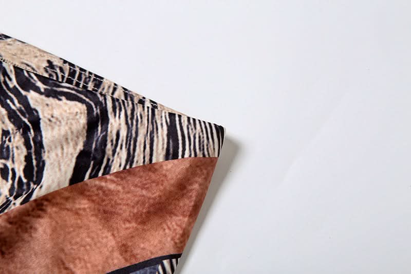 Fall Glam: Geometric Snake Print Long Sleeve Bodycon Jumpsuit - Perfect for Autumn Nights & Halloween