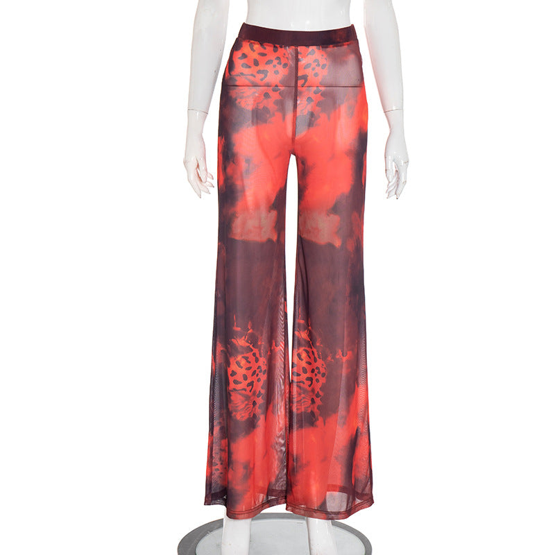 Ignite Y2K Vibes: Red & Black Leopard Mesh Flare Pants - Sheer Statement for Fall Parties & Halloween