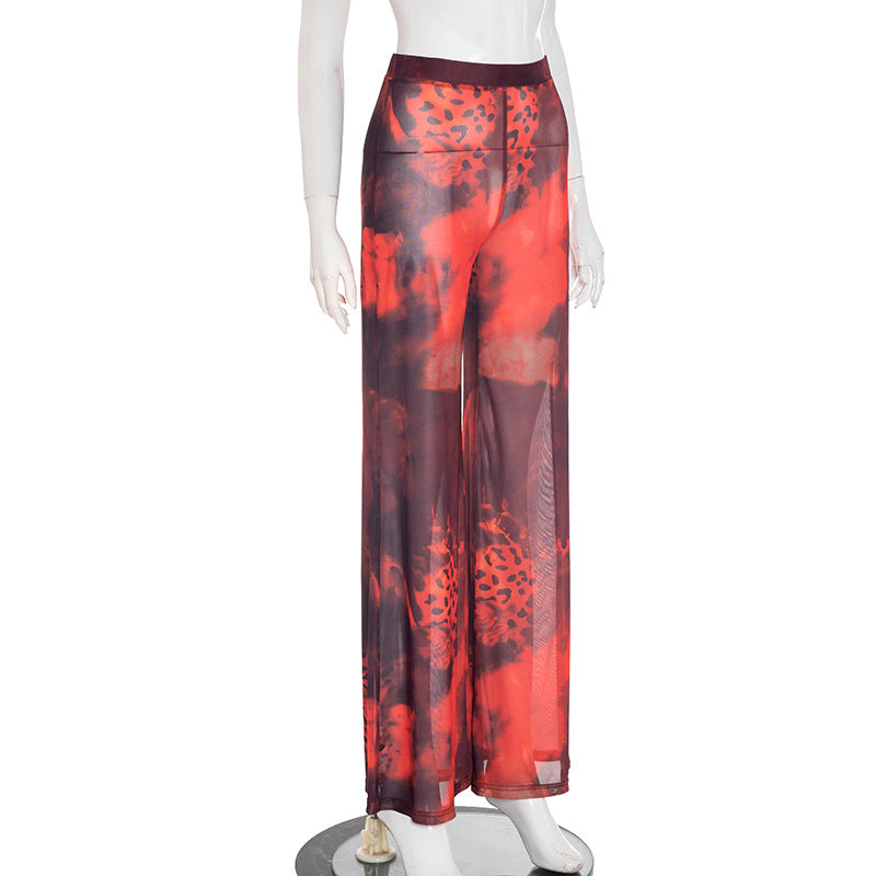 Ignite Y2K Vibes: Red & Black Leopard Mesh Flare Pants - Sheer Statement for Fall Parties & Halloween