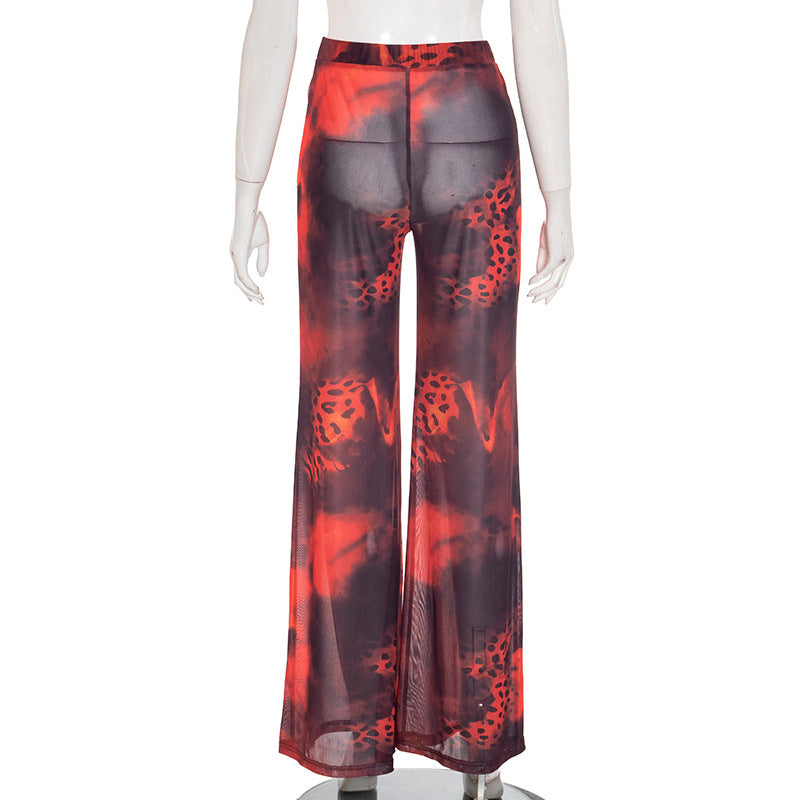 Ignite Y2K Vibes: Red & Black Leopard Mesh Flare Pants - Sheer Statement for Fall Parties & Halloween