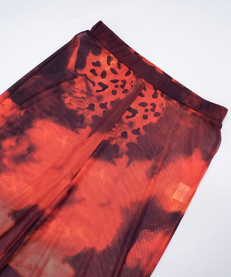 Ignite Y2K Vibes: Red & Black Leopard Mesh Flare Pants - Sheer Statement for Fall Parties & Halloween