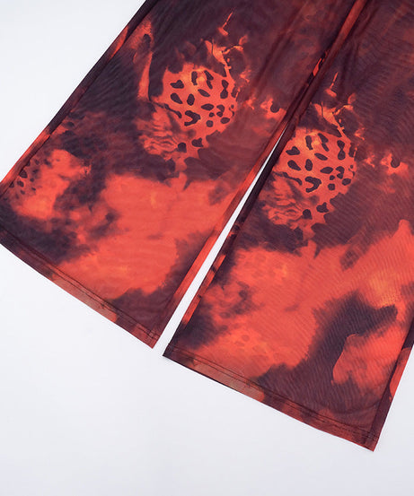 Ignite Y2K Vibes: Red & Black Leopard Mesh Flare Pants - Sheer Statement for Fall Parties & Halloween