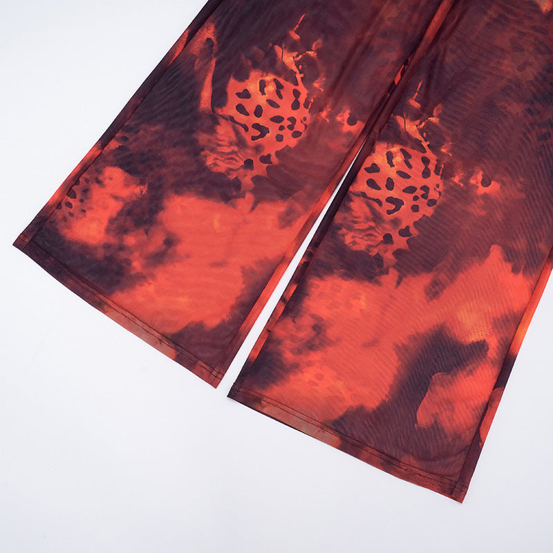 Ignite Y2K Vibes: Red & Black Leopard Mesh Flare Pants - Sheer Statement for Fall Parties & Halloween