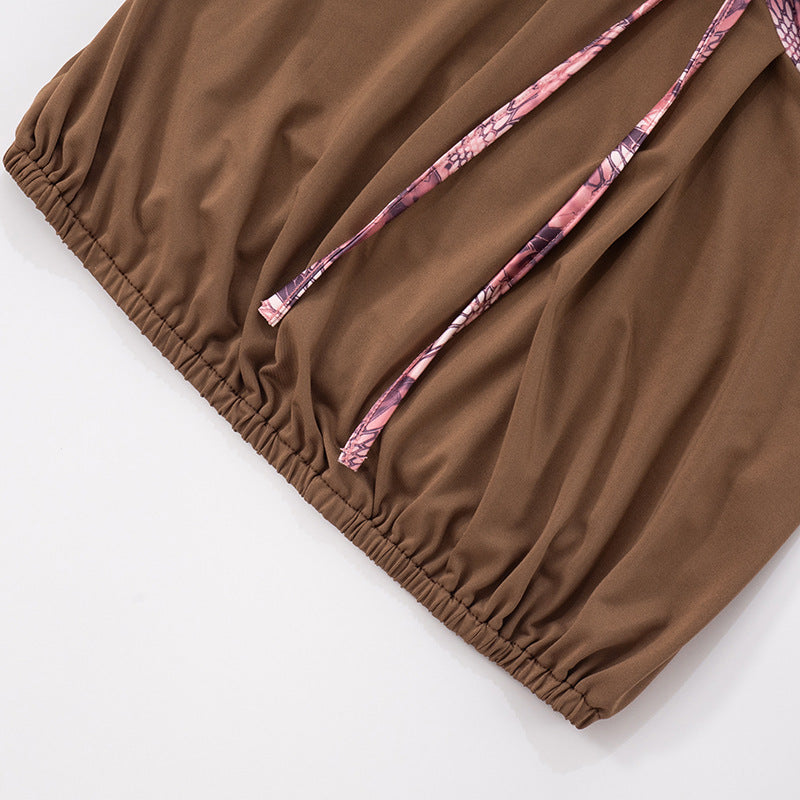 Chic Fall Tube Top: Abstract Print & Buckle Tie-Front Strapless for Y2K Style