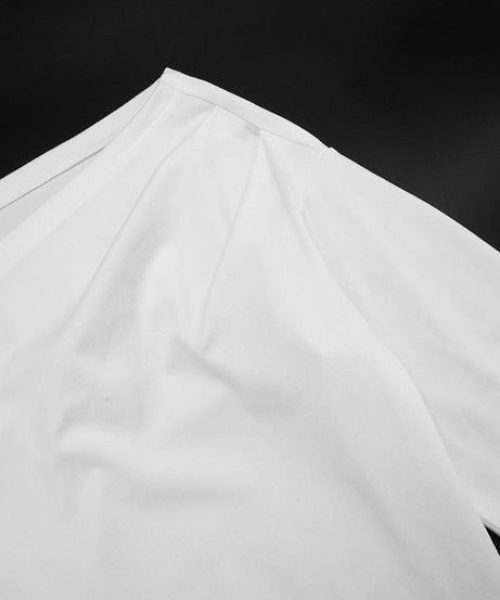 Effortless Chic: Black Off-Shoulder Knotted Long Sleeve Top for Fall & Holiday Style