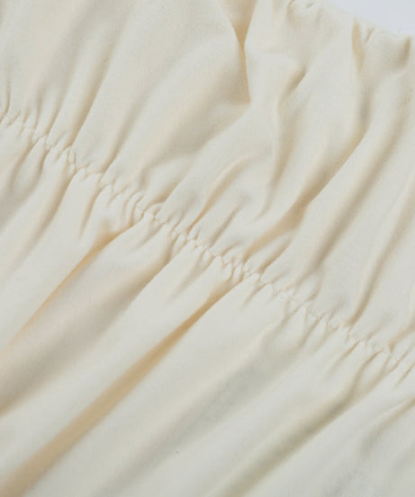 Chic Ivory Satin Cowl Neck Long Sleeve Mini Dress with Shimmer Fringe – Perfect for Holiday & NYE Parties