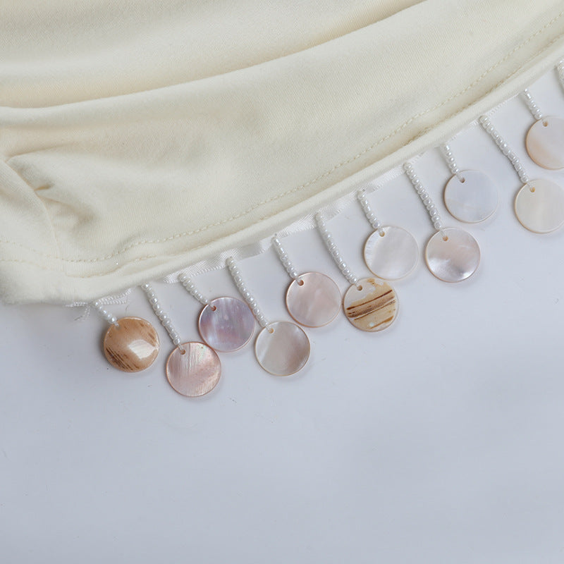 Chic Ivory Satin Cowl Neck Long Sleeve Mini Dress with Shimmer Fringe – Perfect for Holiday & NYE Parties