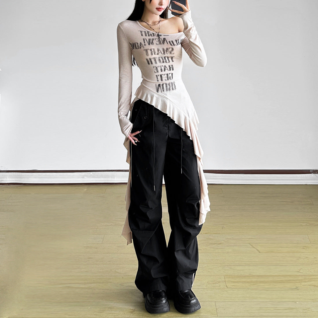 Rebel Ruffle: Asymmetrical One-Shoulder Graphic Top | Fall Street Style Essential