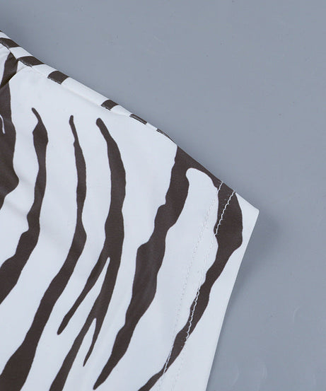 Fierce Zebra Print One-Shoulder Long Sleeve Crop Top - Your Go-To for Fall Nights & Holiday Parties