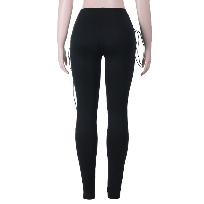 Sultry Side Lace-Up Leggings - Edgy Black Hollow Out Pants for Fall & Halloween