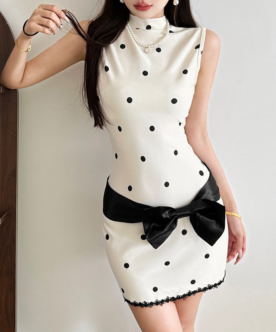 Holiday Glam: Chic Polka Dot Mock Neck Mini Dress with Statement Bow