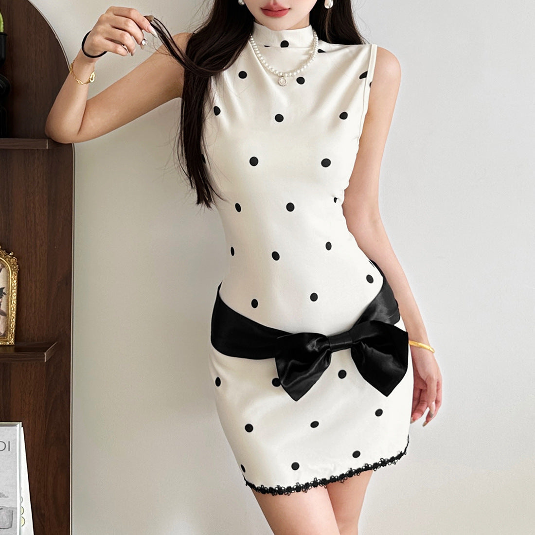 Holiday Glam: Chic Polka Dot Mock Neck Mini Dress with Statement Bow