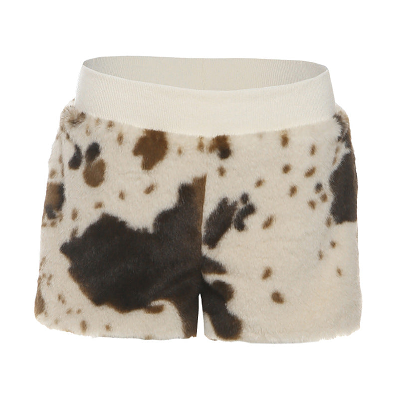 Untamed Chic: Faux Fur Cow Print Medium Rise Shorts – Your Cozy Fall & Holiday Statement Piece