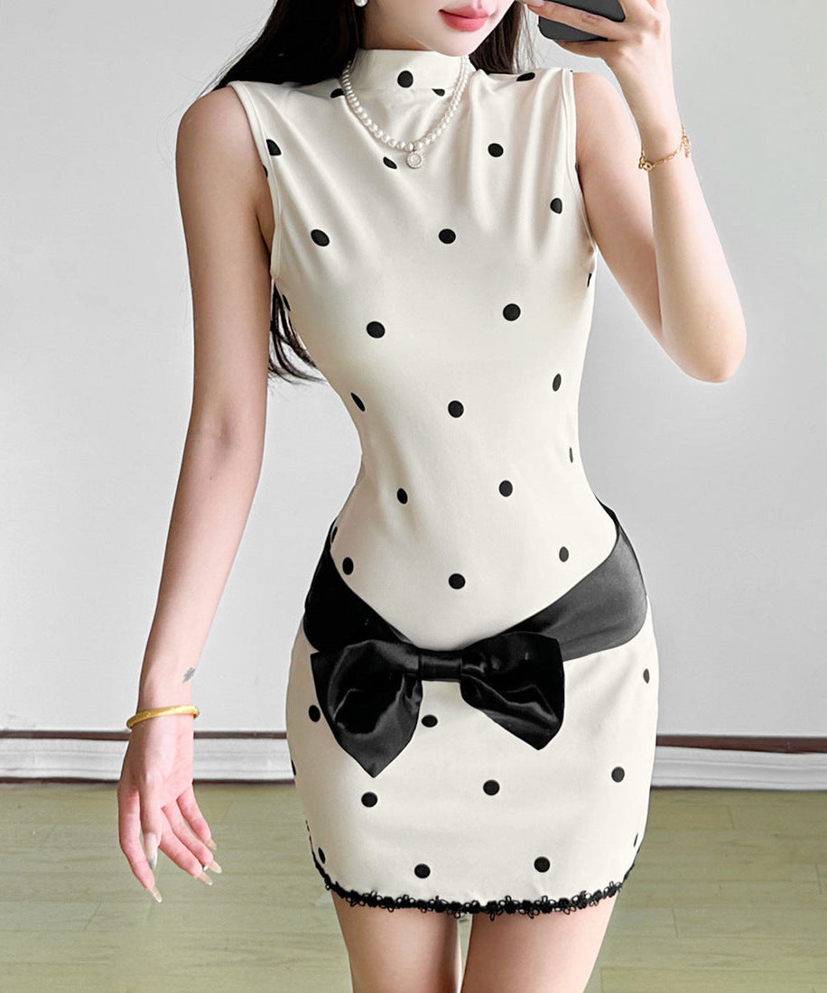 Holiday Glam: Chic Polka Dot Mock Neck Mini Dress with Statement Bow