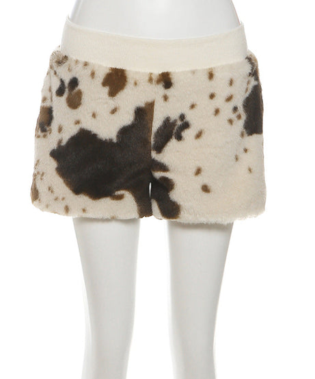 Untamed Chic: Faux Fur Cow Print Medium Rise Shorts – Your Cozy Fall & Holiday Statement Piece